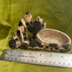 2 small carved figurines with reservoir/vase- monkey, bird, flowers